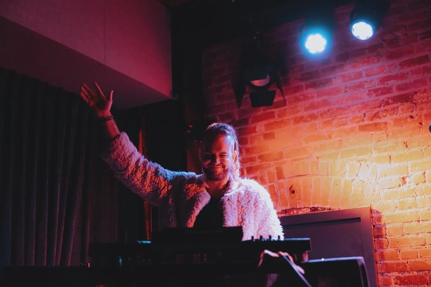 The Great Medicine Show DJ set in a brick-walled venue