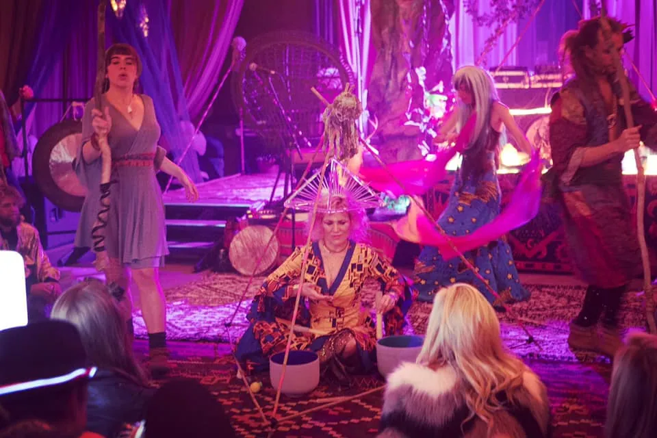 The ensemble opens a show with sound bowls, gongs and dancers